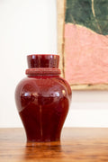 Oxblood glazed ceramic vase