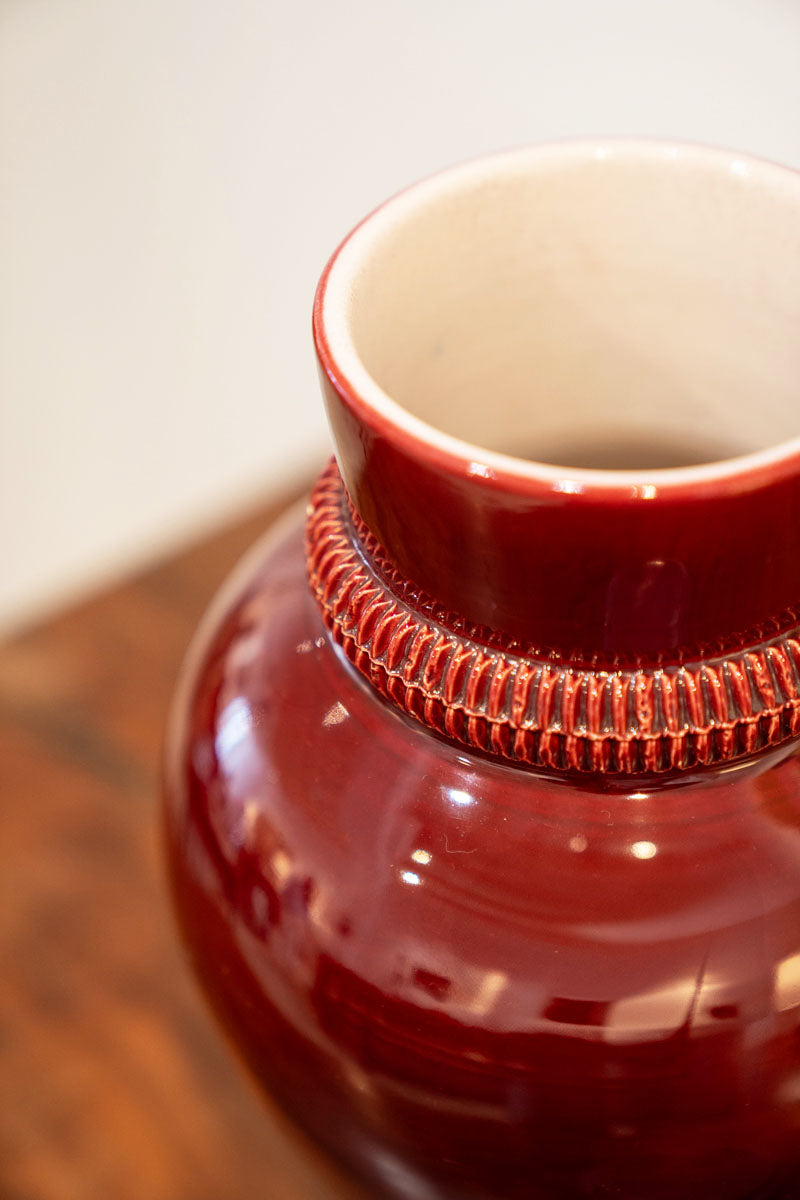 Oxblood glazed ceramic vase