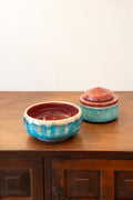 A bowl and an enamelled ceramic box