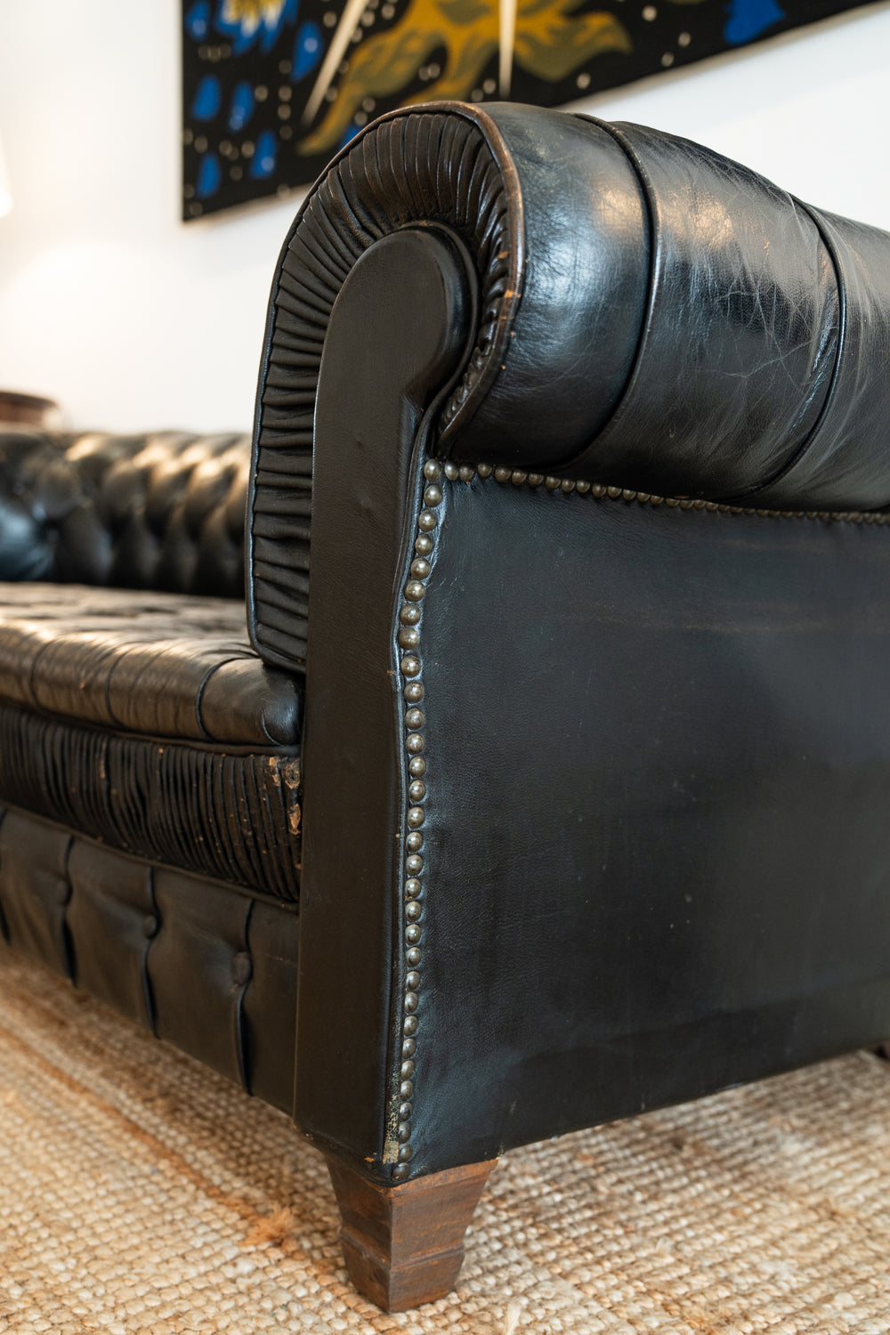 Sofá Chesterfield de cuero negro