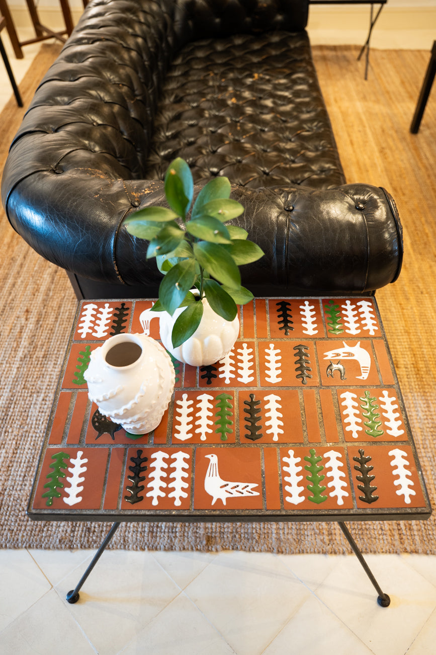 Wrought iron and ceramic side table