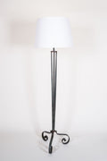 Wrought iron tripod floor lamp