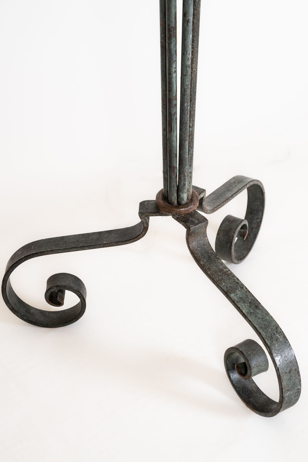 Wrought iron tripod floor lamp