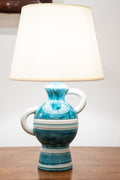 Pequeña lámpara de mesa de cerámica esmaltada