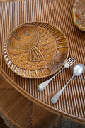 Service d’assiettes et plat poisson en céramique émaillée