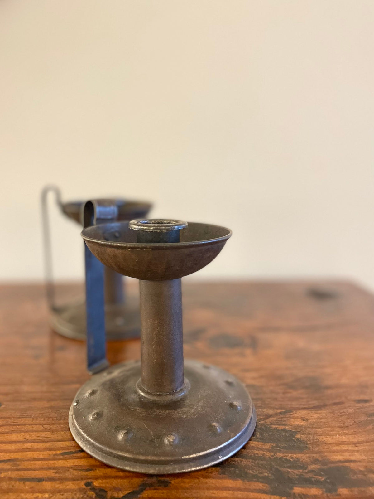 Pair of pewter candlesticks