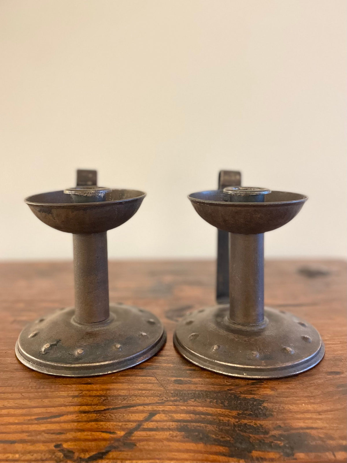 Pair of pewter candlesticks