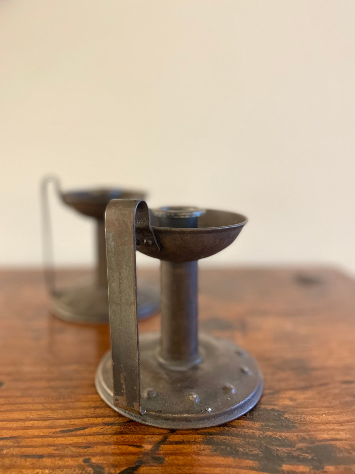 Pair of pewter candlesticks