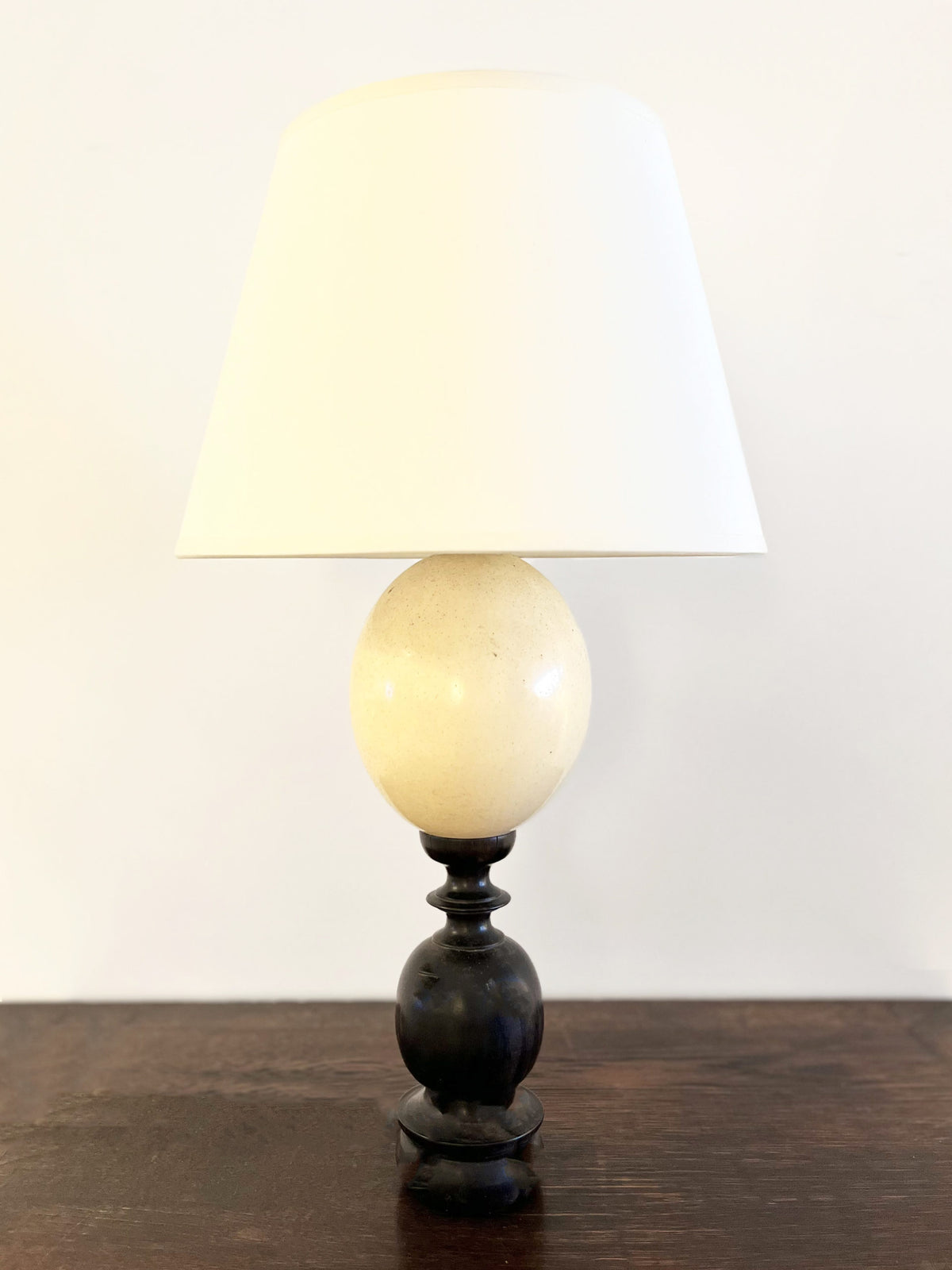 Turned ebony and ostrich egg lamp
