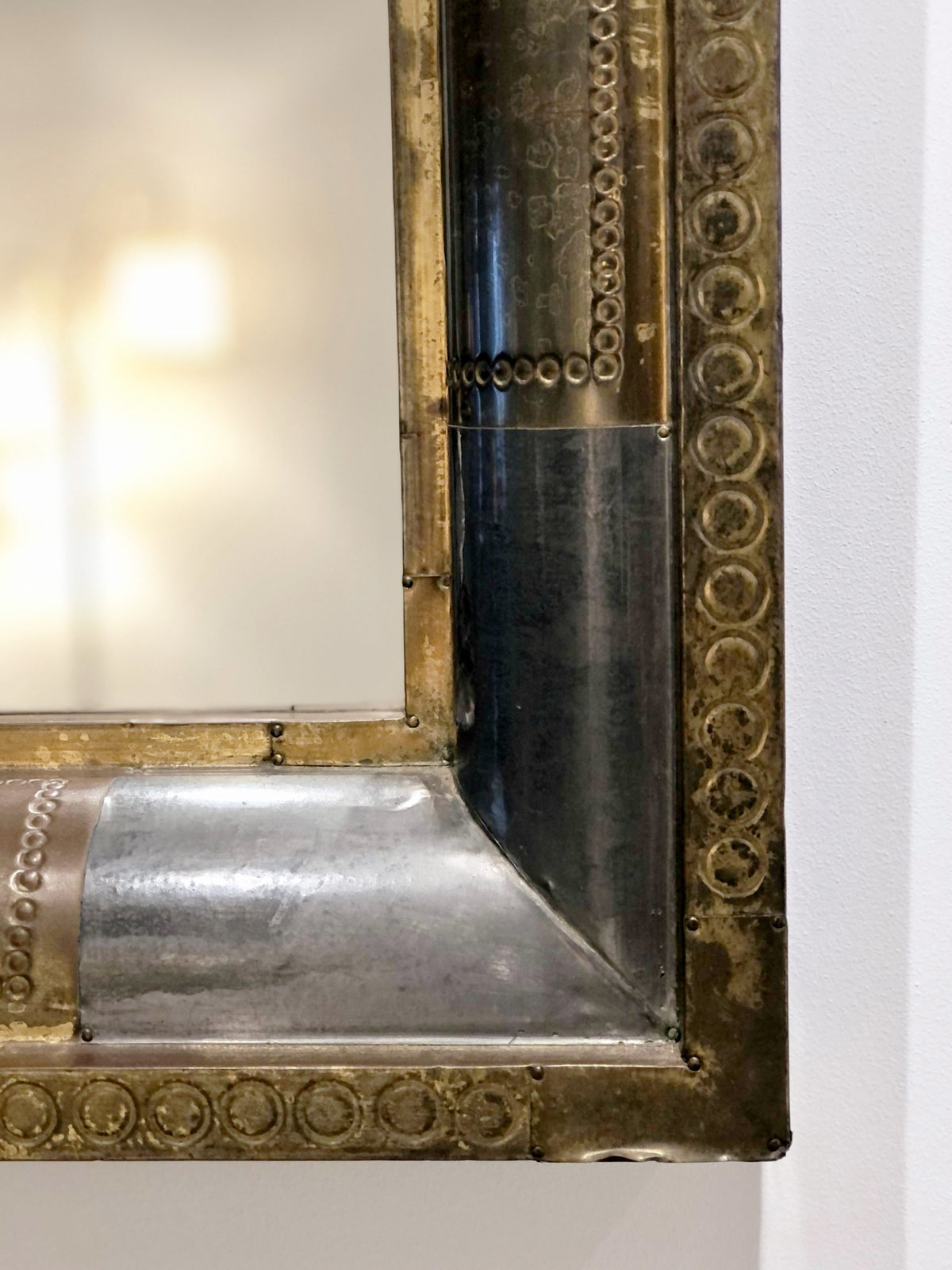 Tin and brass mirror