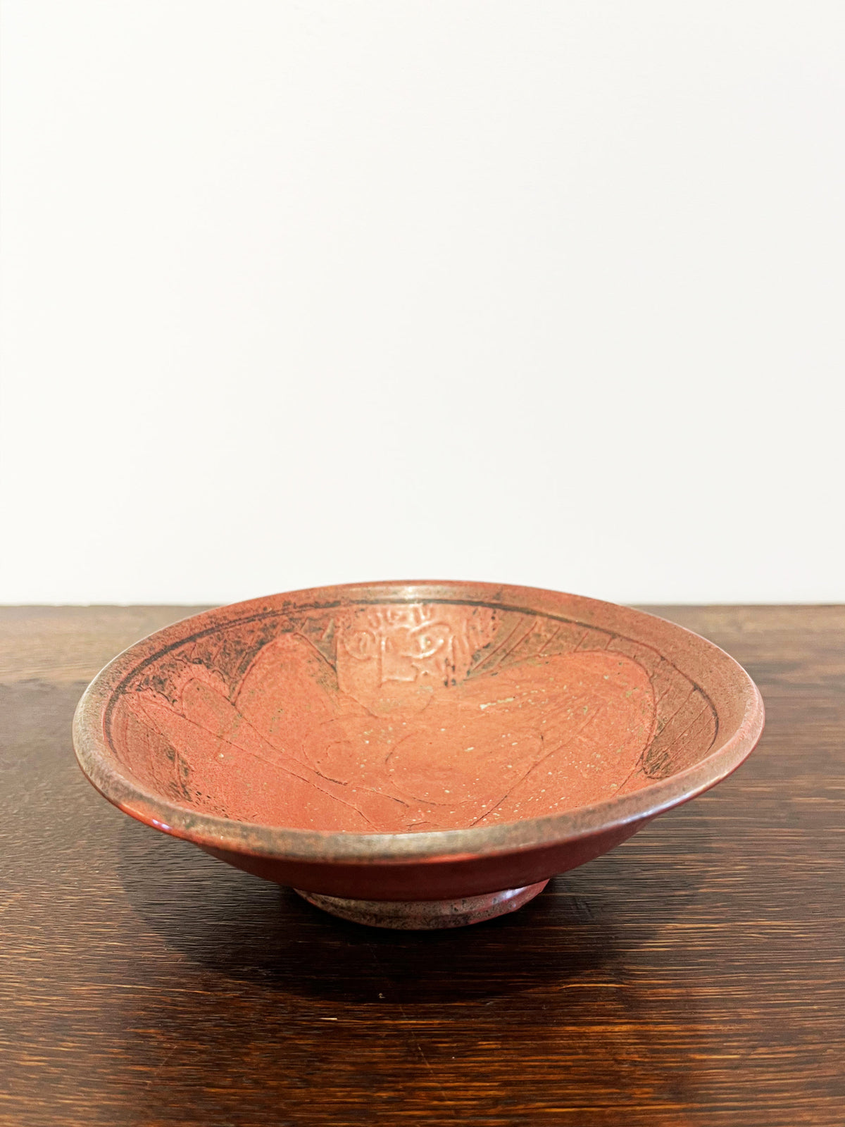 Glazed ceramic bowl showing a woman