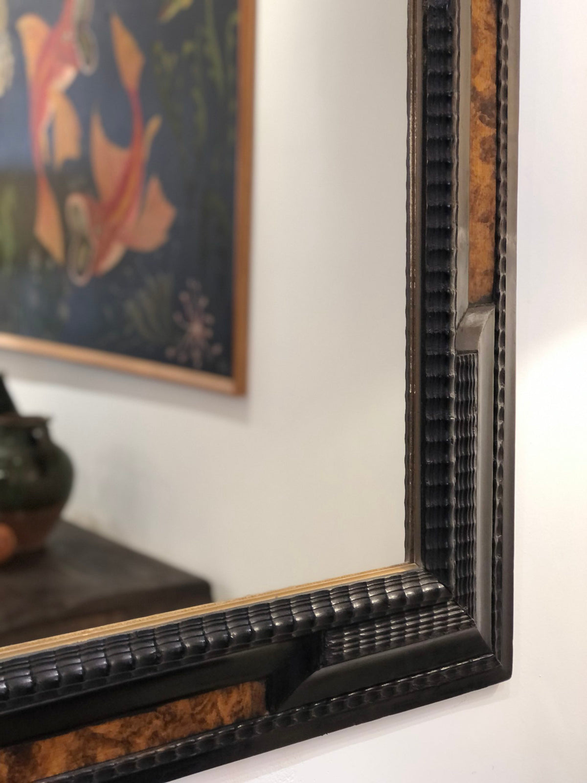 Large Flemish style ebonised ripple frame mirror