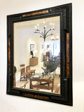 Large Flemish style ebonised ripple frame mirror