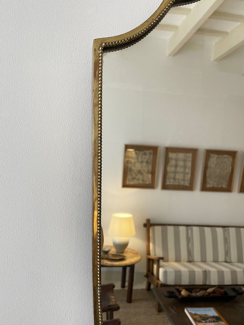 Brass shield mirror