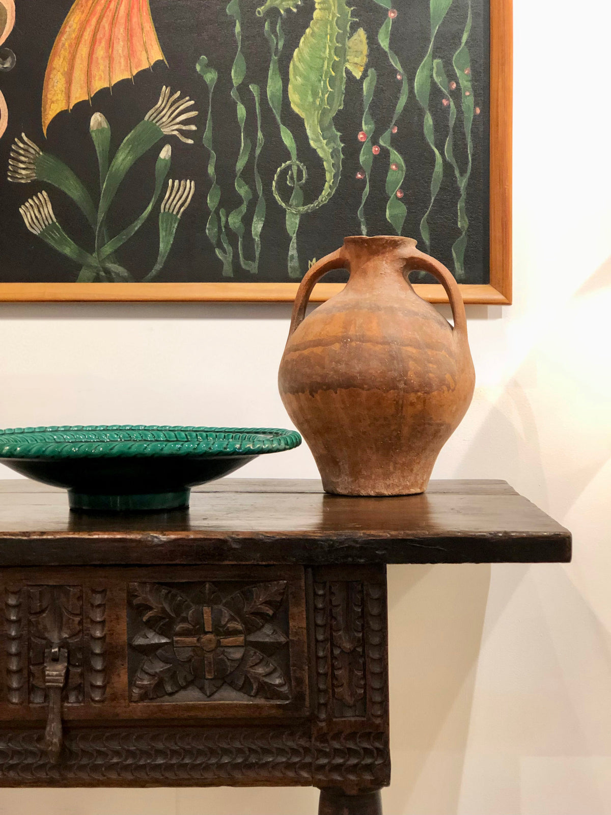 Chestnut console with double carved drawers