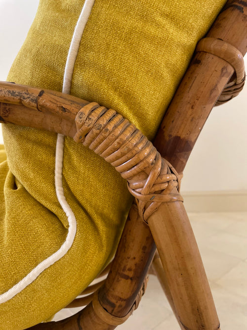 Bamboo and rattan sofa with yellow cushions