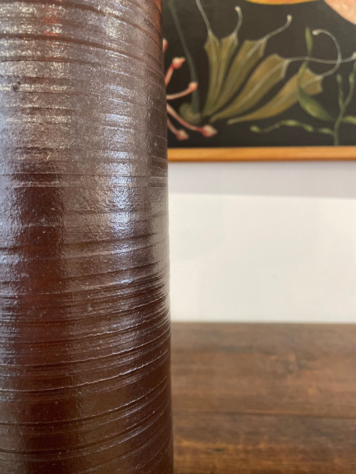A tall hand wheel thrown stoneware lamp