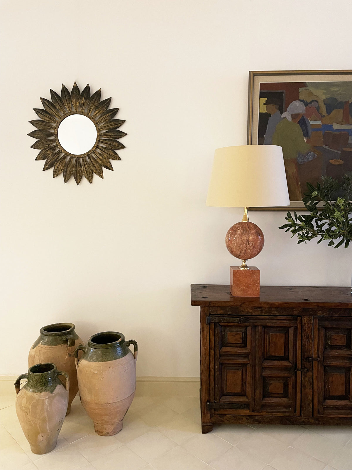 Tall lamp in red travertine and gilded brass