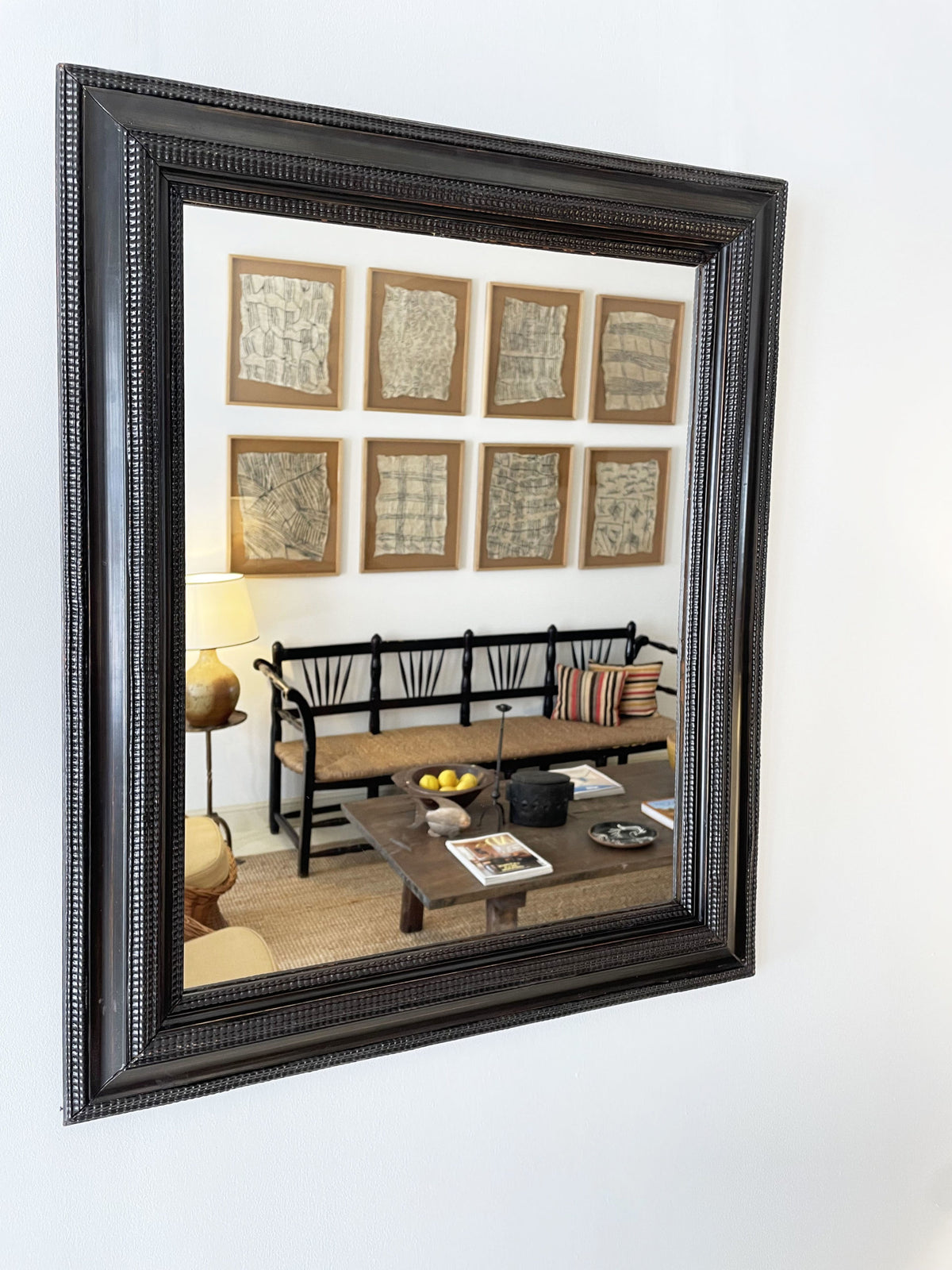 Flemish style ebonised ripple frame mirror