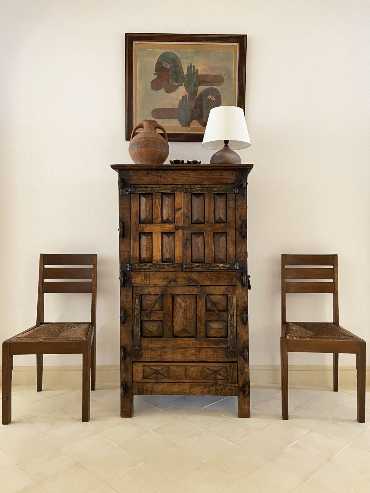 A unique Spanish solid oak and wrought iron cabinet