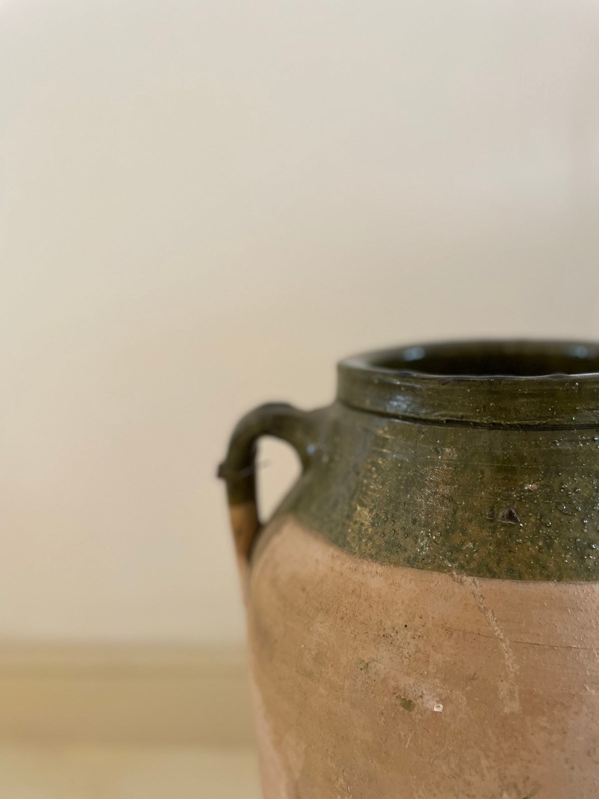 Large terracotta and green enameled jar
