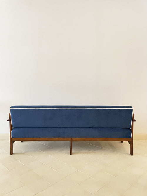 Blue velvet sofa