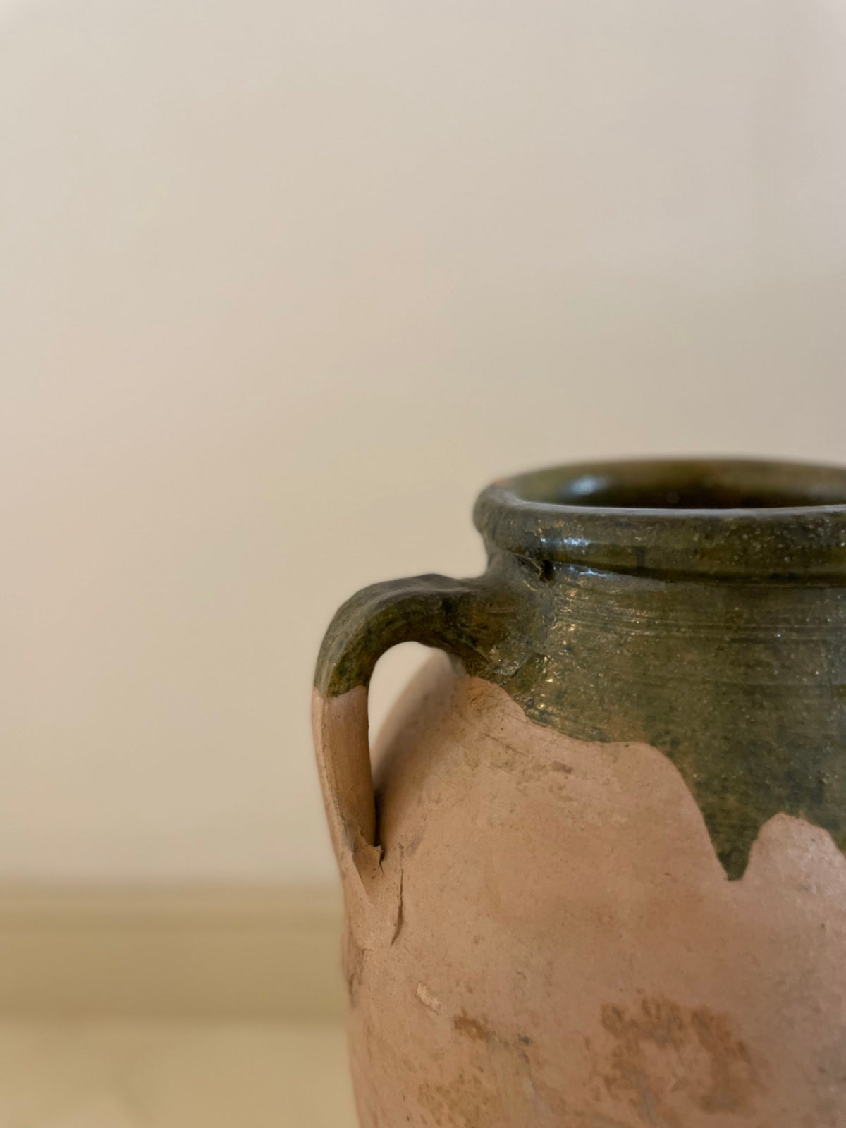 Large terracotta and green enameld jar