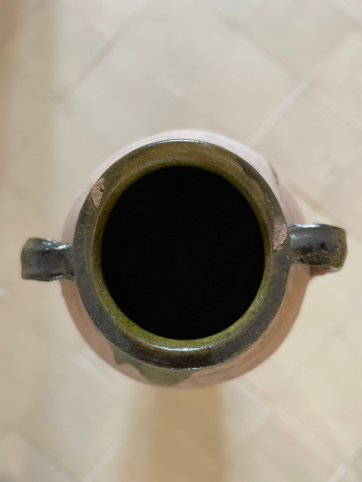 Large terracotta and green enameld jar