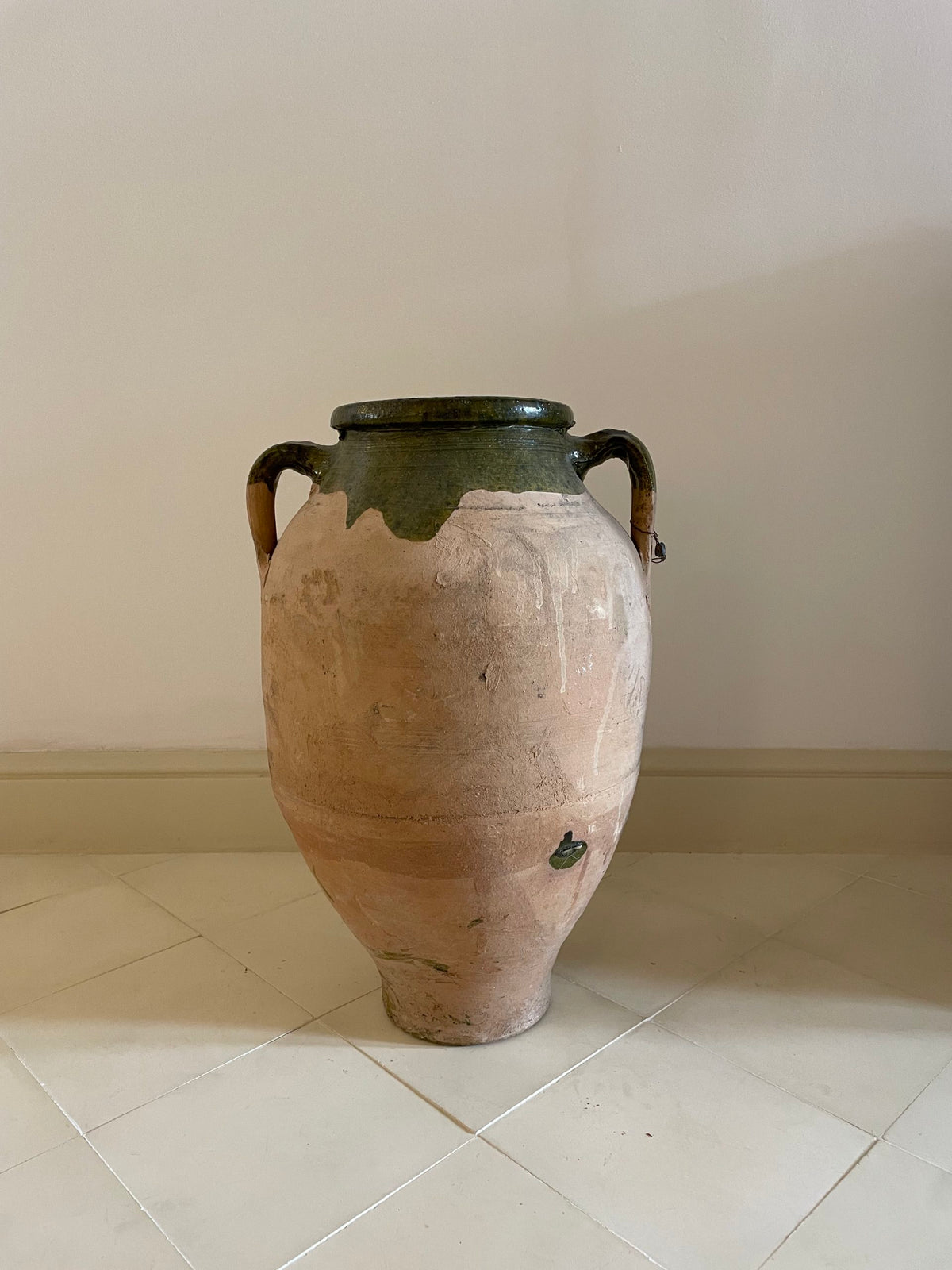 Large terracotta and green enameld jar