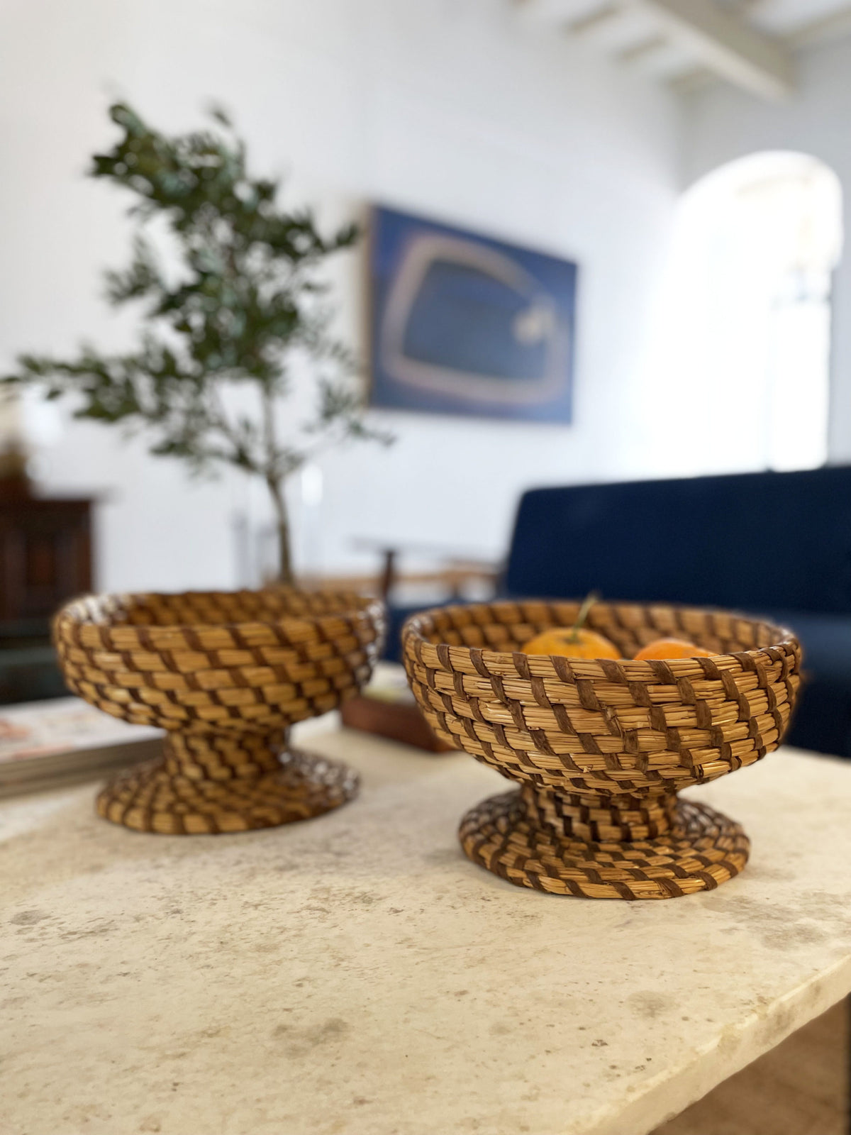Pair of woven straw bowls