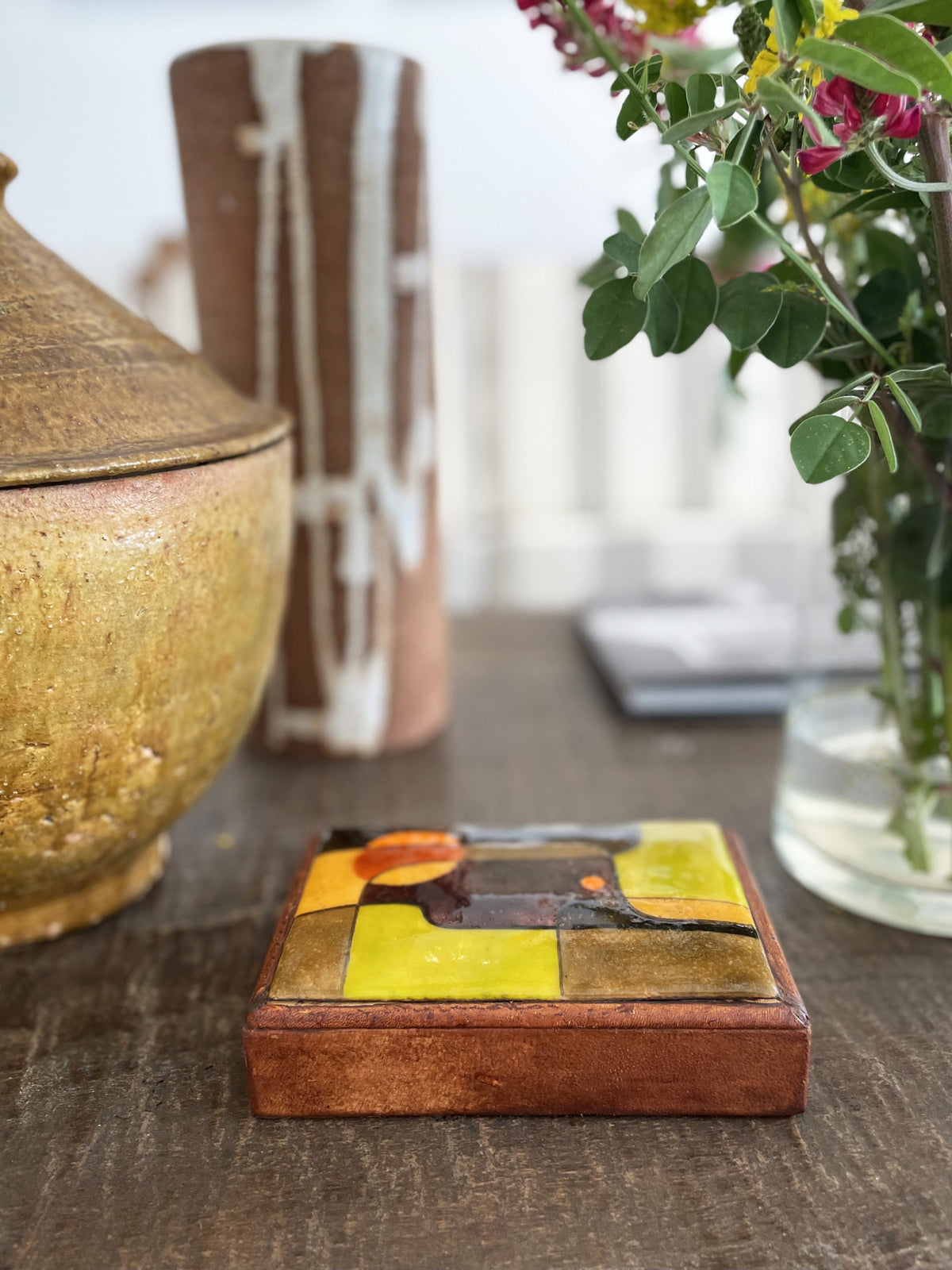 Leather box with polychrome ceramic lid