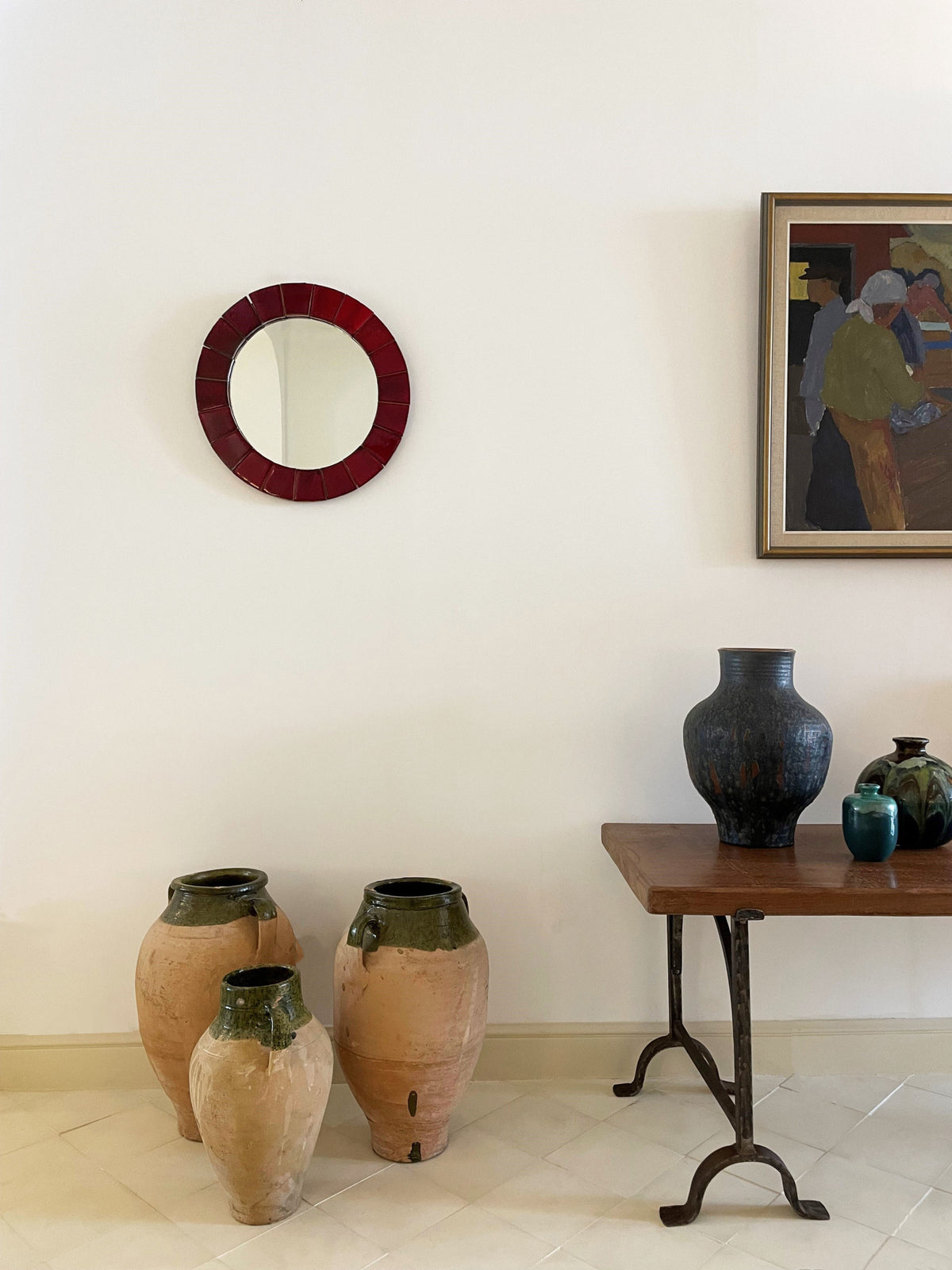 Circular red ceramic mirror