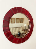 Circular red ceramic mirror