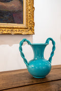 Turquoise blue ceramic vase with two large turned handles