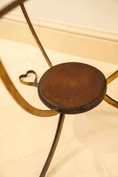 Brass side tablel table with glass top and heart-shaped legs