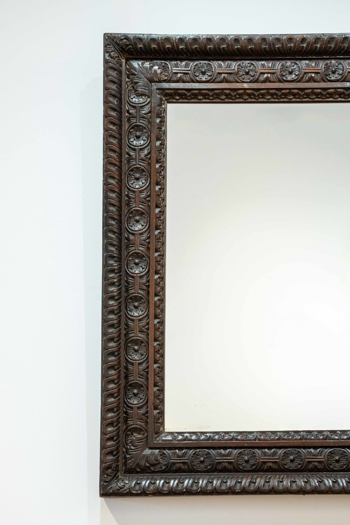 Carved oak mirror