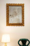 Carved gilded mirror