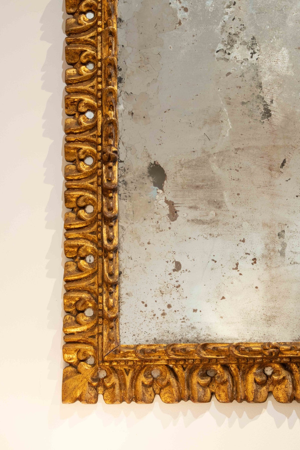 Carved gilded mirror