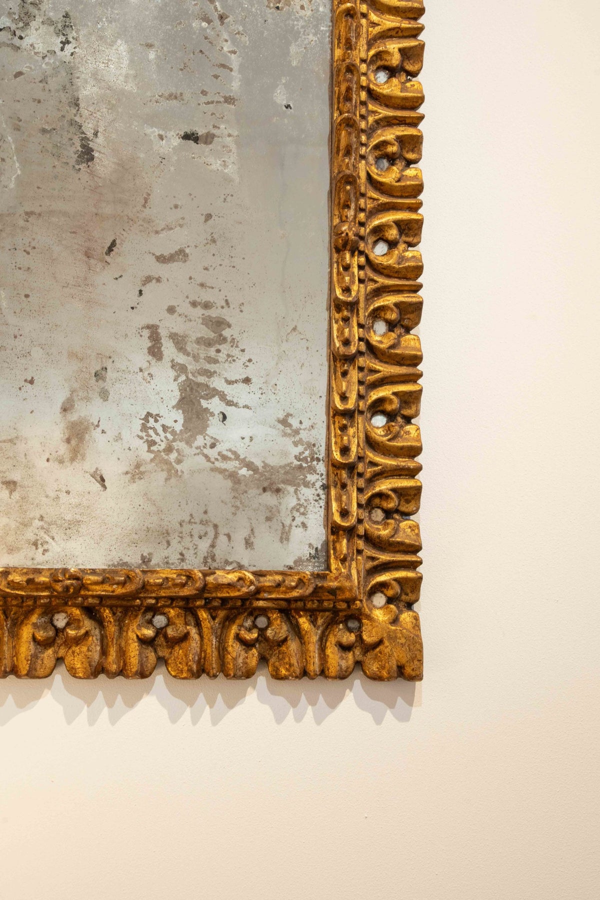 Carved gilded mirror