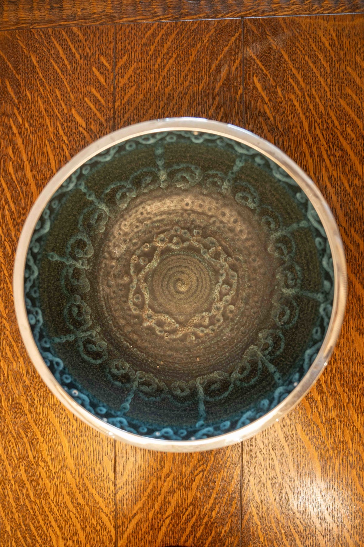 Large ceramic and silver-plated metal bowl