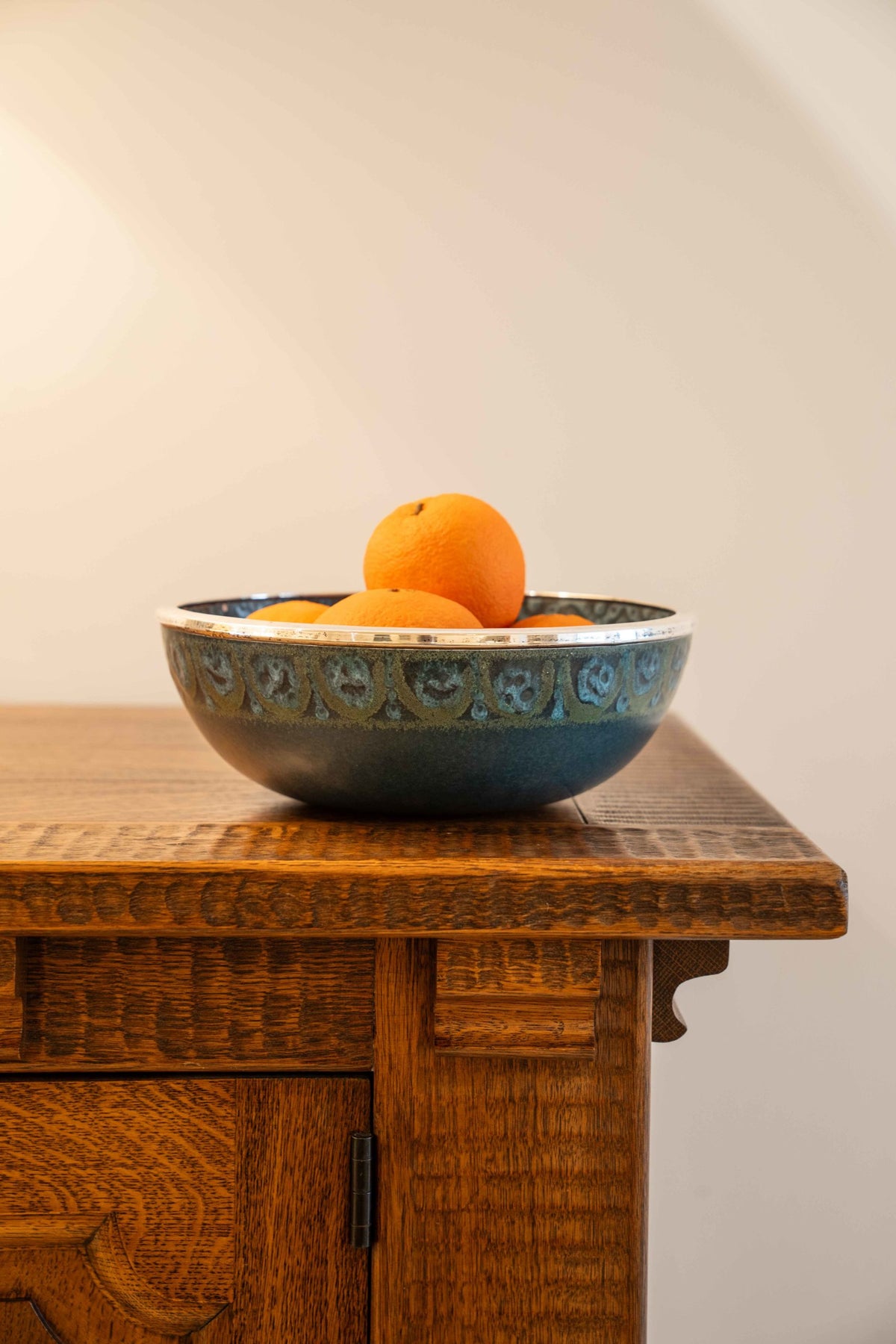 Large ceramic and silver-plated metal bowl