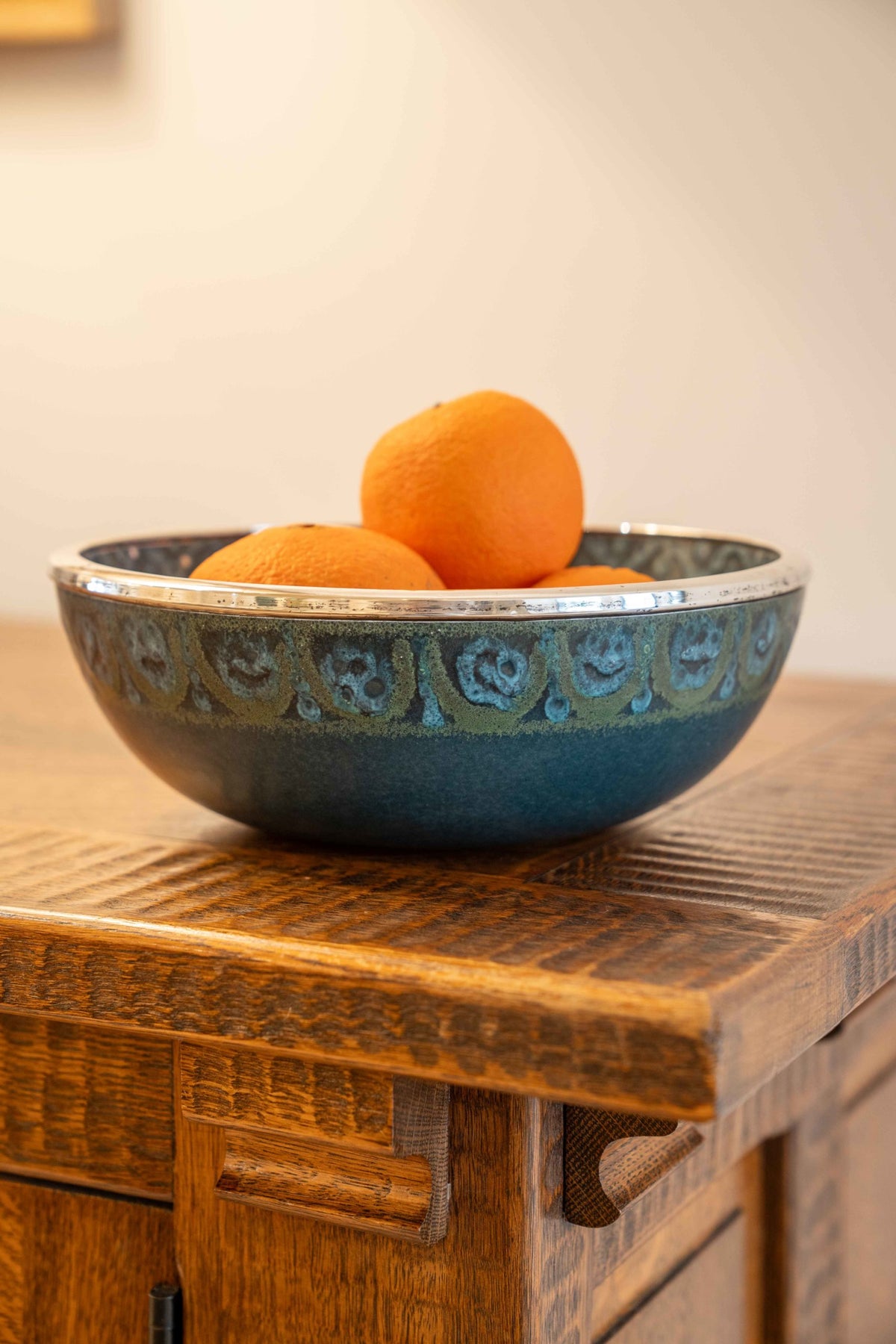Large ceramic and silver-plated metal bowl