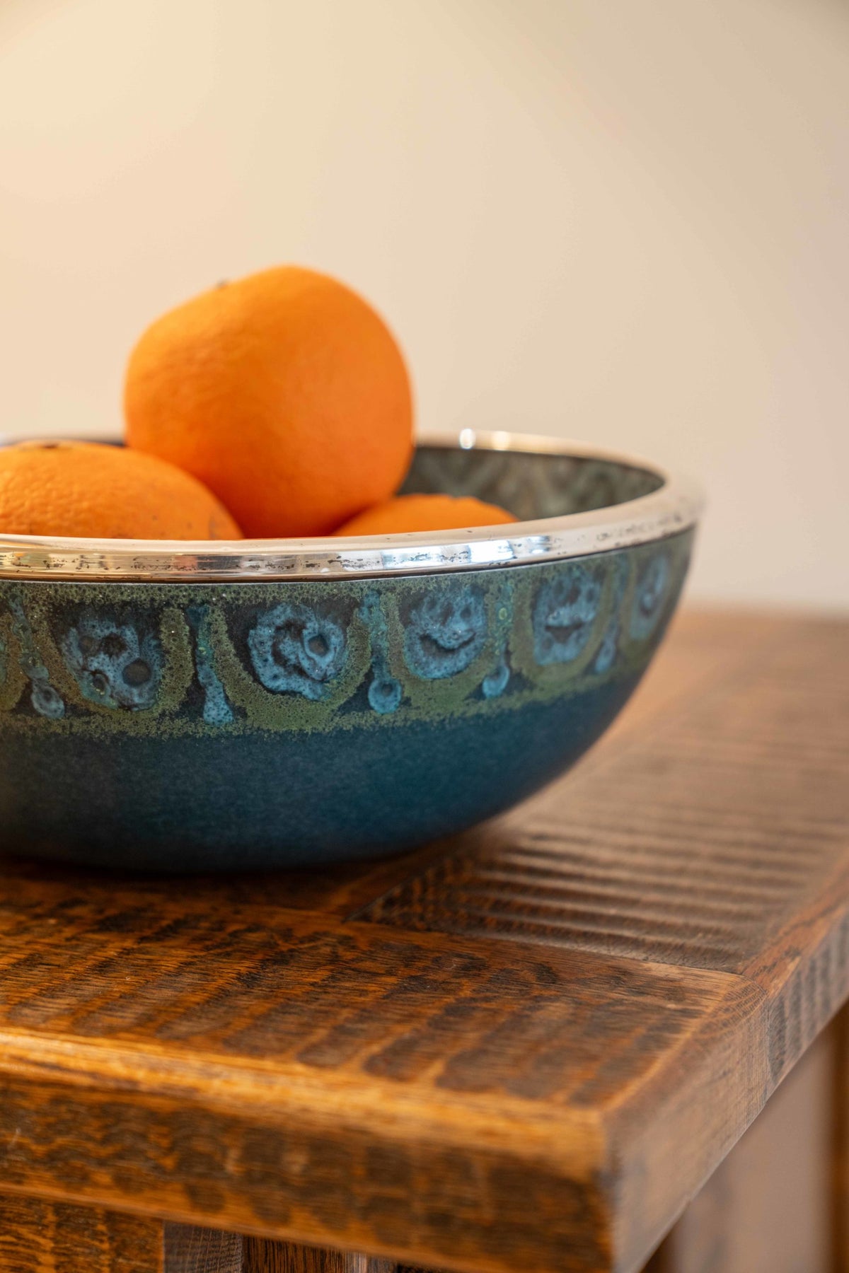 Large ceramic and silver-plated metal bowl