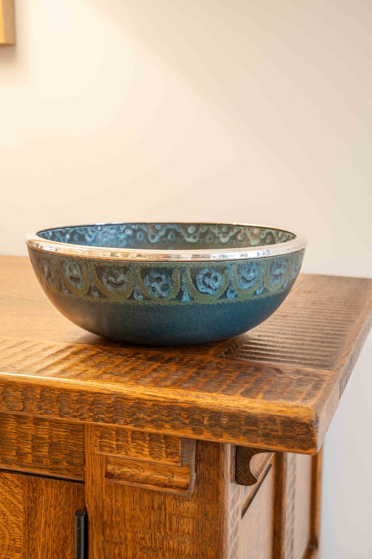 Large ceramic and silver-plated metal bowl