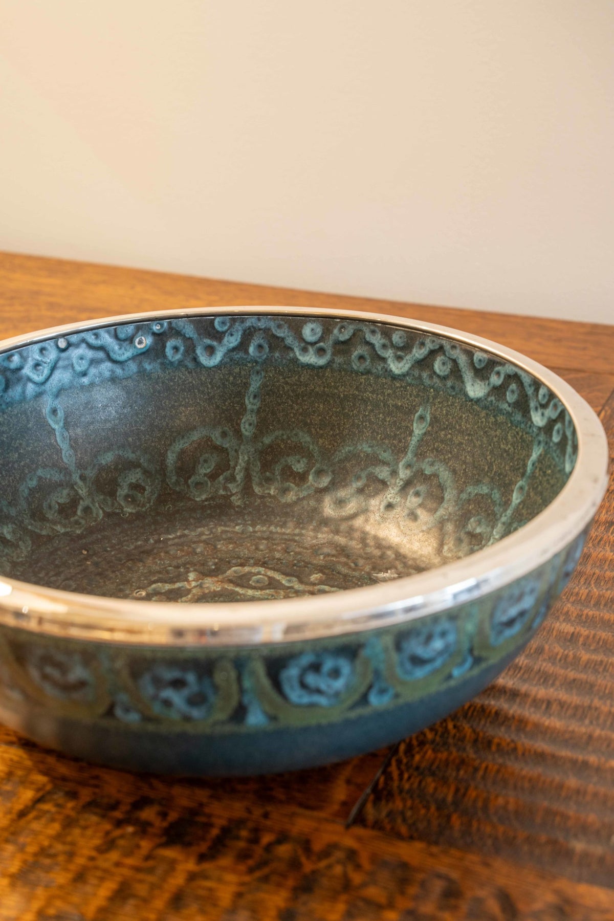 Large ceramic and silver-plated metal bowl