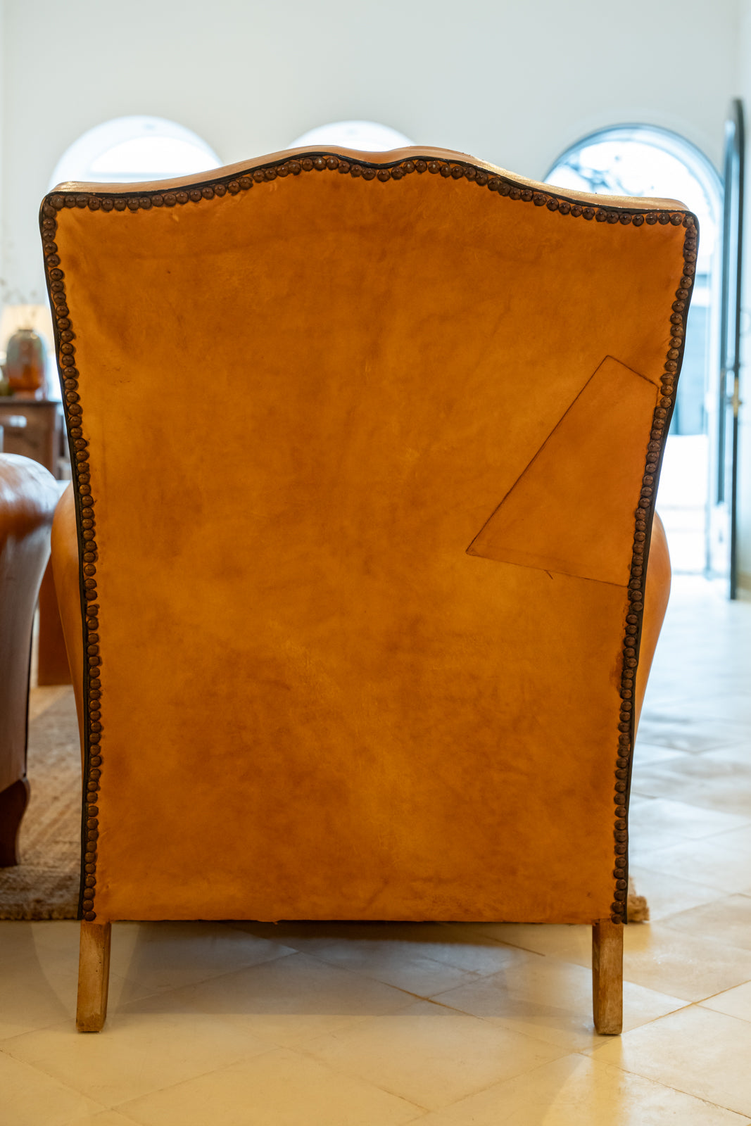 Paire de fauteuils en cuir