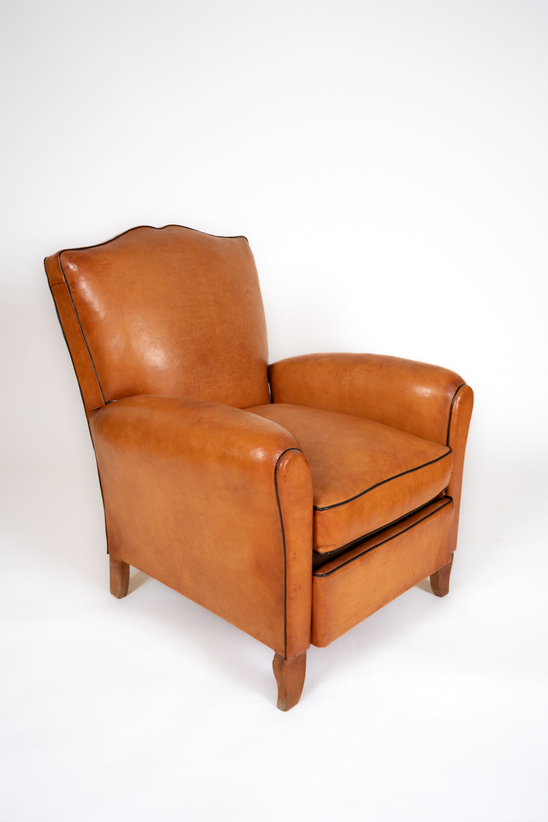Paire de fauteuils en cuir