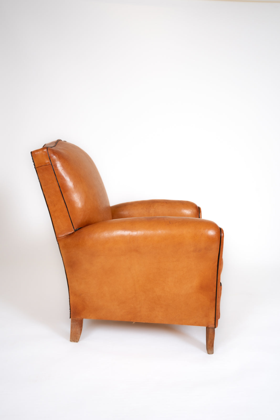 Paire de fauteuils en cuir