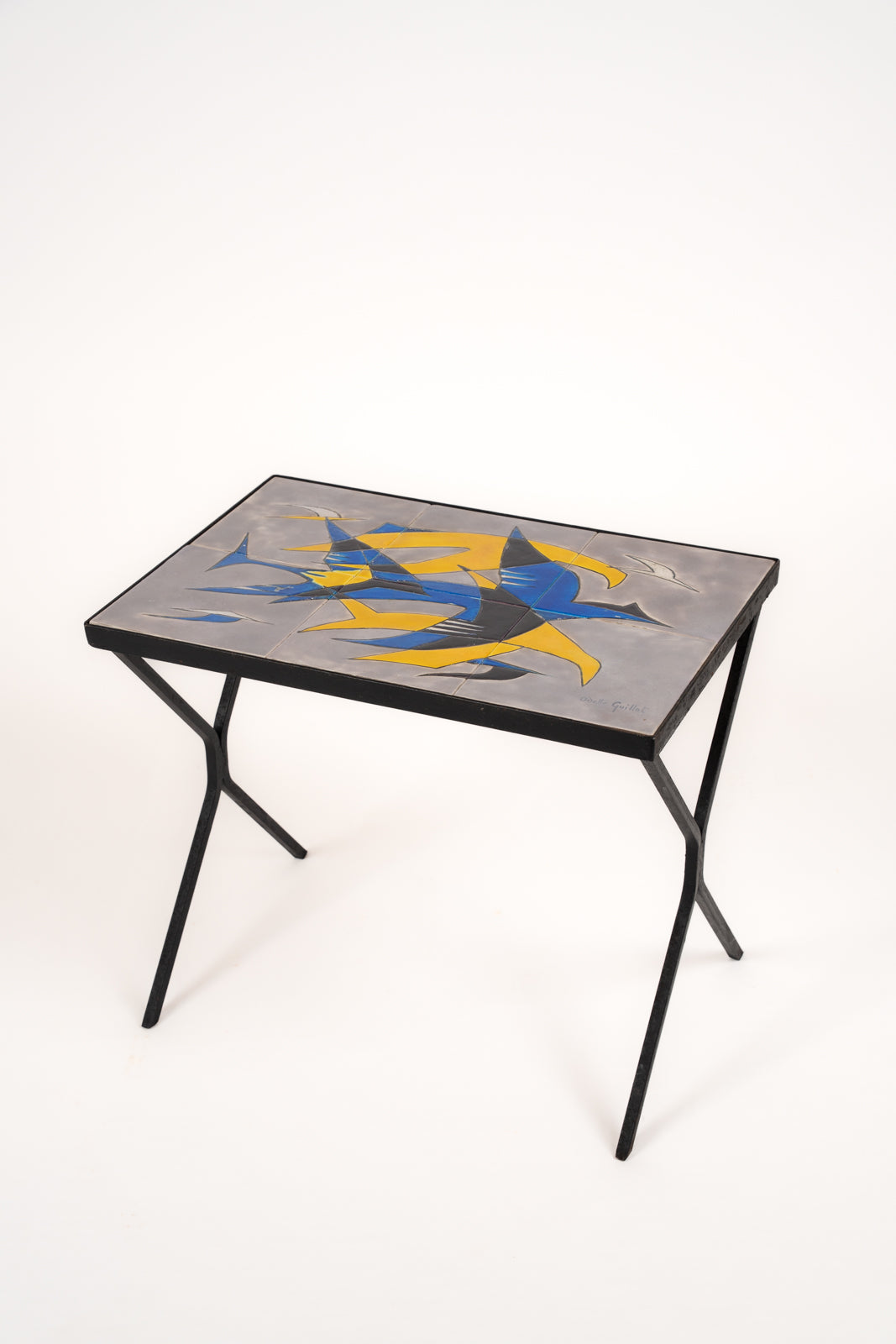 Wrought iron and glazed ceramic side table