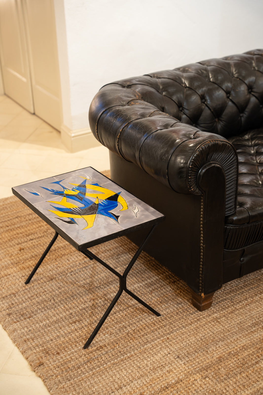 Wrought iron and glazed ceramic side table